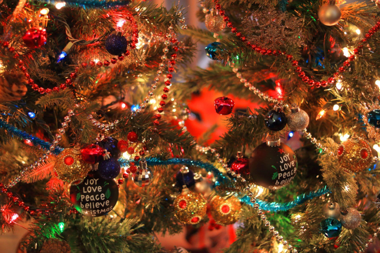 Decorating Your Community Celebration with Glass Ornaments and a Christmas Garland with Lights